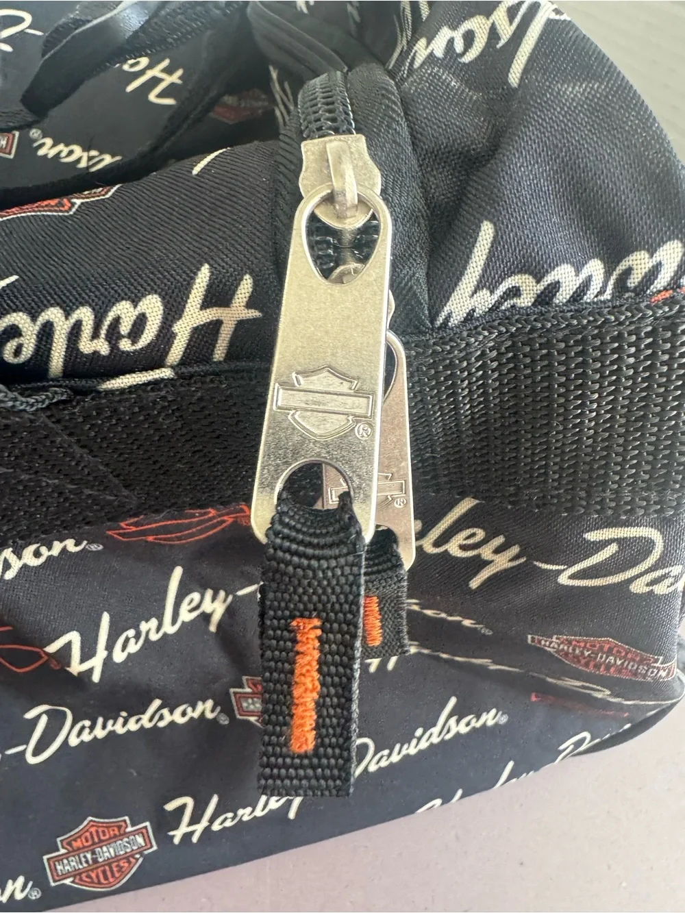 Harley-Davidson Black Duffel with White Script and Orange Accents